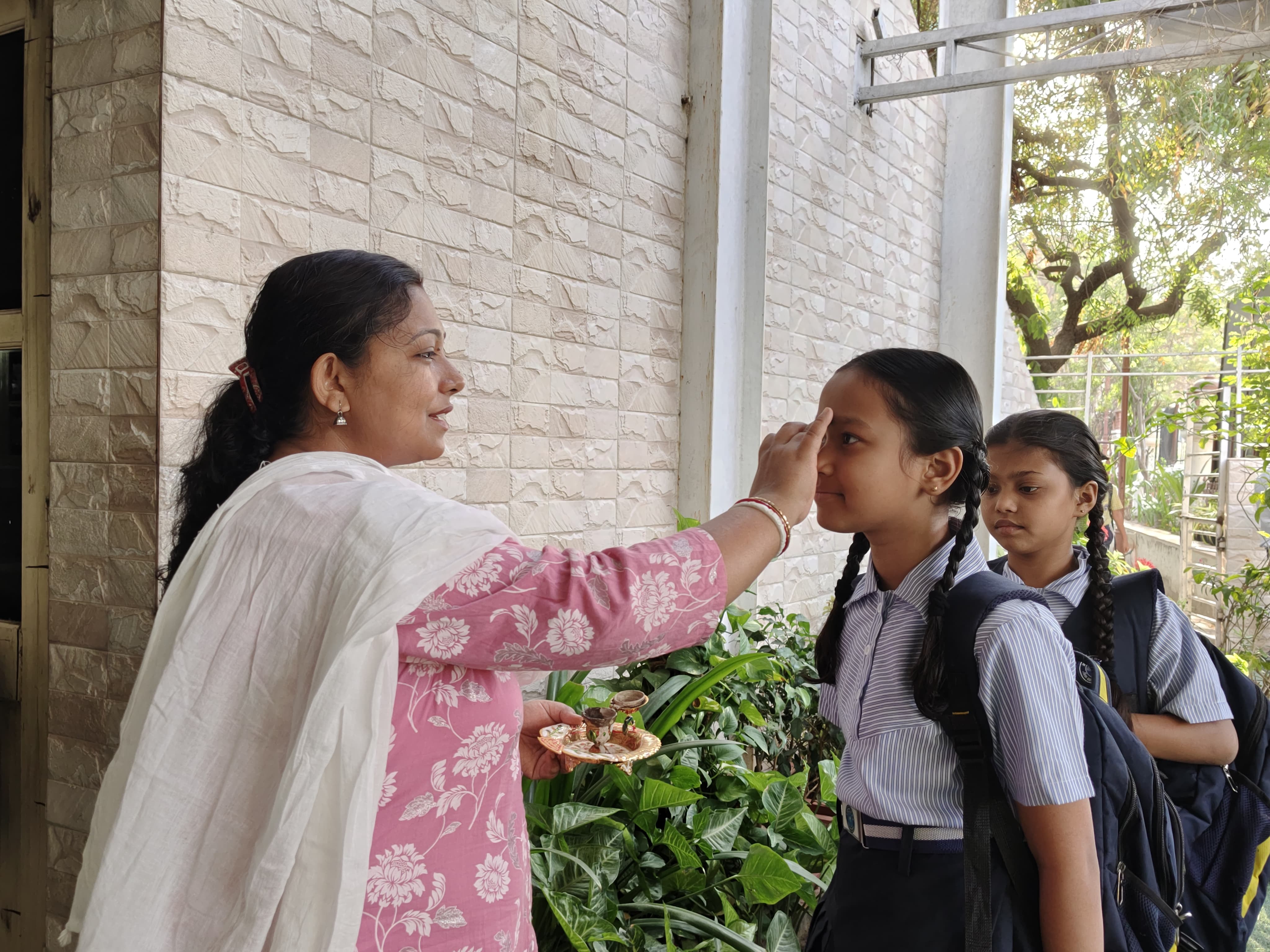 Welcoming students at the school